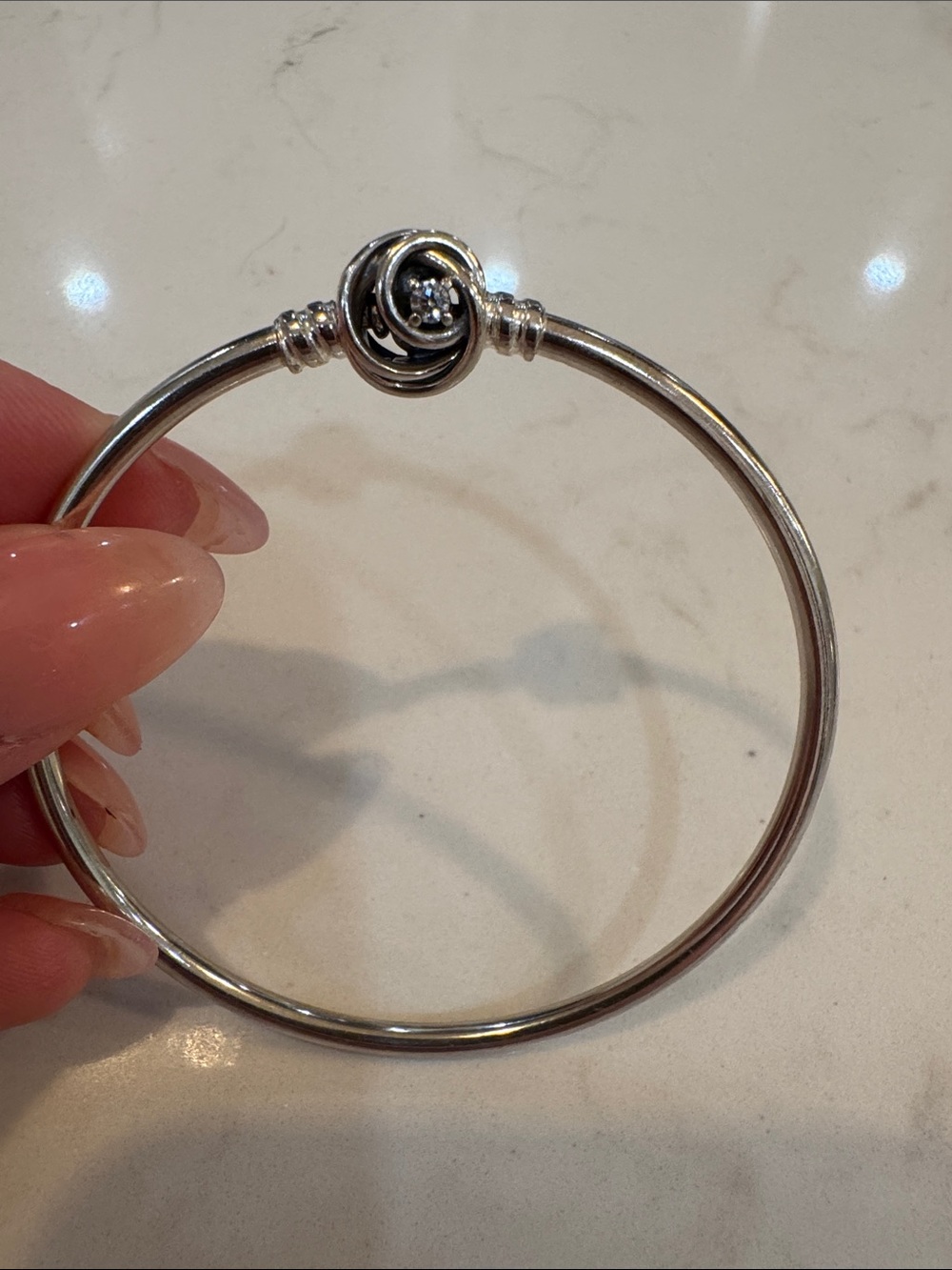 PANDORA Limited Edition
Moments Sterling Silver
Bangle & Cubic Zirconia Charm